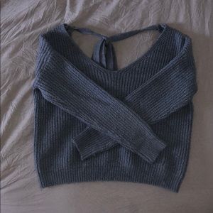 Almost new open backed blue sweater